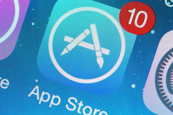 Apple обязали принимать совершенные не в App Store платежи